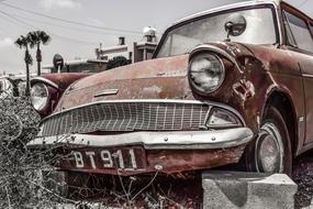 red grey photo of Old Rustic Car