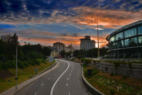 winding road near a modern building