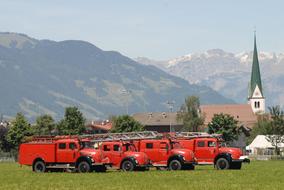 fire trucks in a mountain village