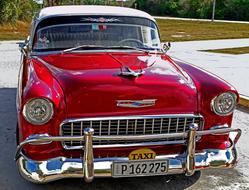 vintage red car in cuba