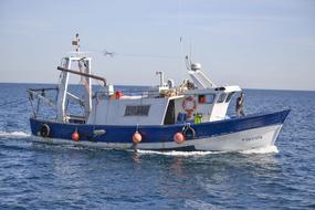 Sea Water Ship on the water on a sunny day