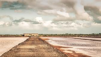 grey Sky over old House and road