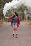 Portrait of girl with Smoke on Road