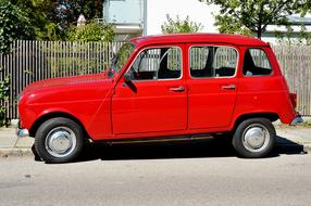 Renault R4 parked near the fence