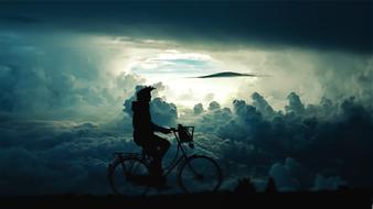 sky cyclist clouds sunset