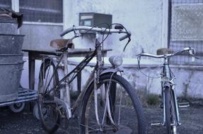 two old bicycles in black white background