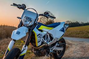 new Motorcycle parked on roadside at dusk