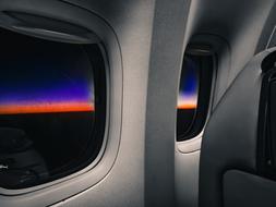 view from the airplane window at the sunrise