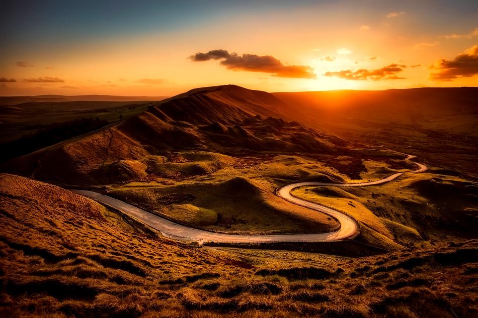 road through the hills at sunset