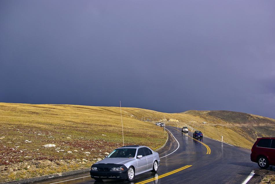 highway traffic in colorado mountains in storm