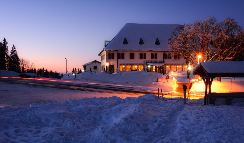 building near road at scenic winter evening