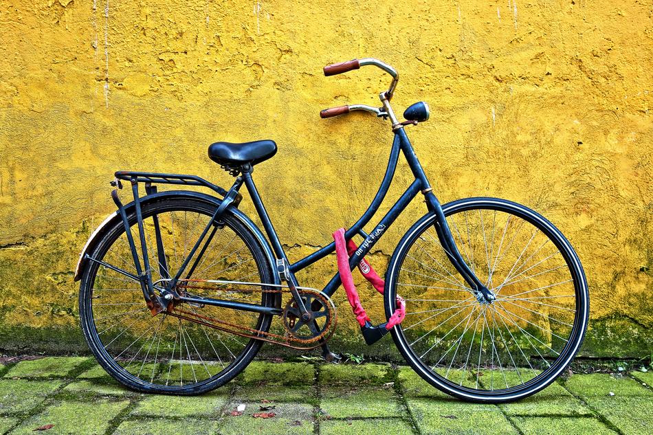 retro bike near yellow wall