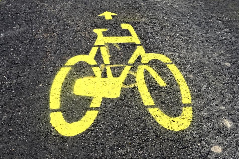 yellow silhouette on the bike path
