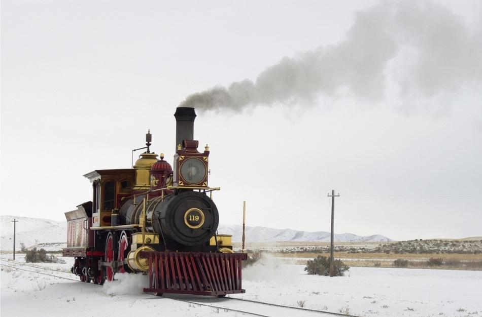 smoking steam locomotive in winter