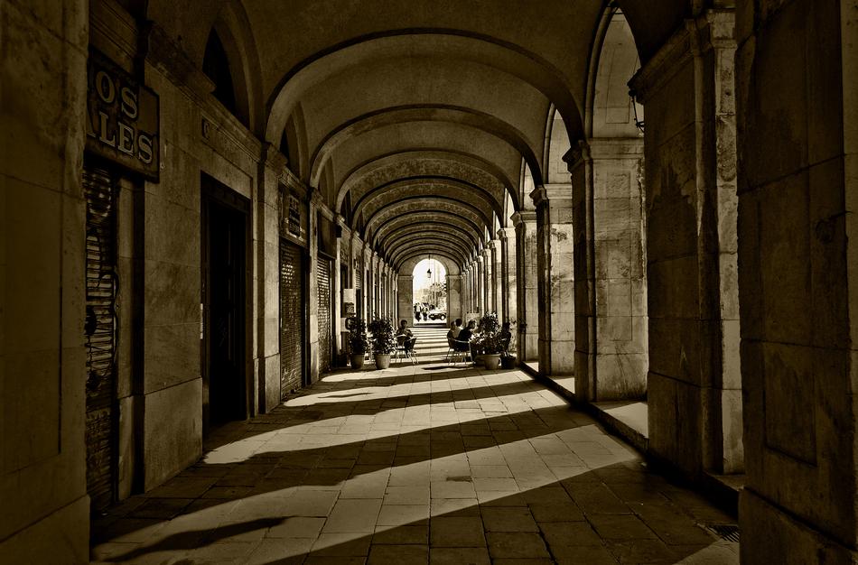 monochrome photo of arched architecture in european city