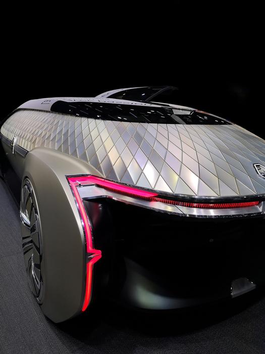 Shin and colorful concept car, with the red lights, clipart