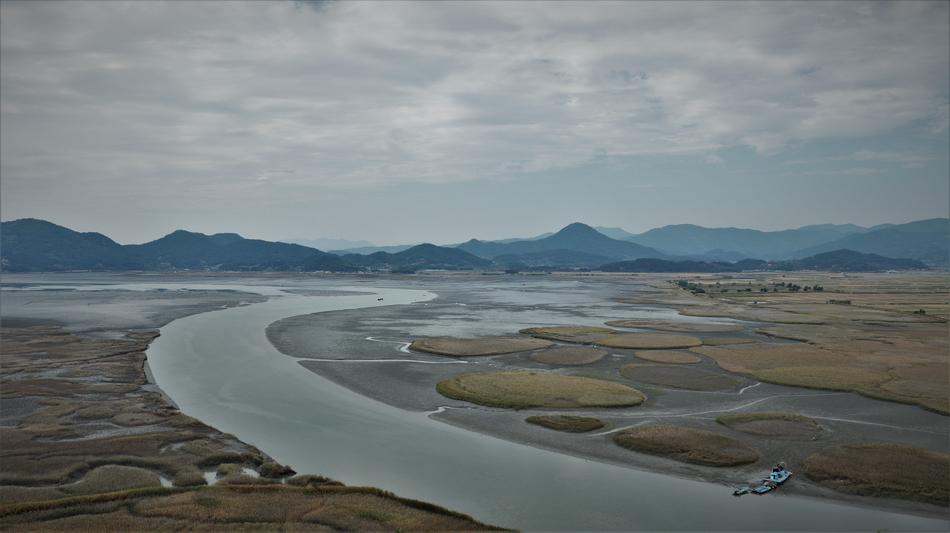 panoramic view of river at mountains, south korea, suncheon bay