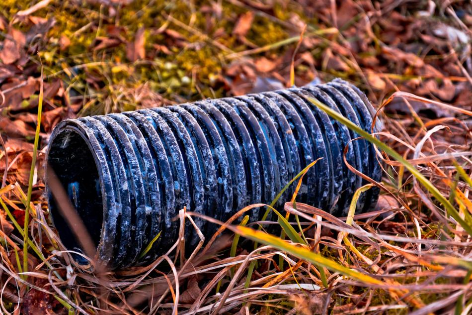 photo of metal part on meadow