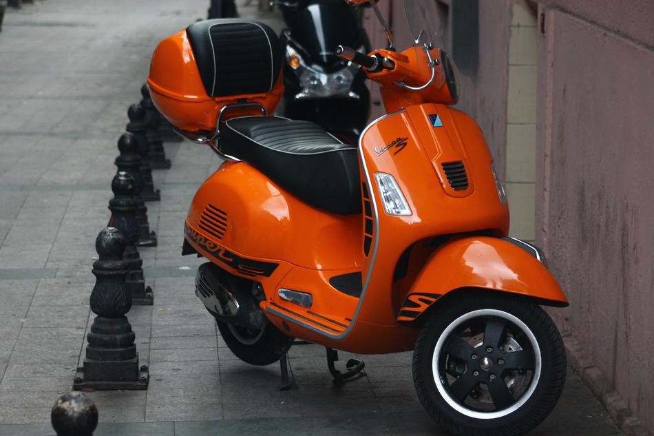 Orange and black scooter
