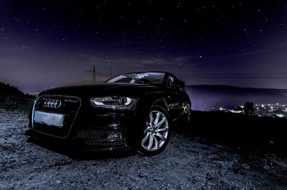 black sports car at dusk
