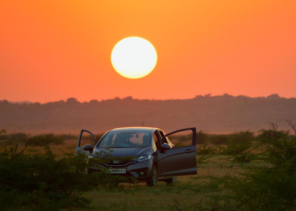 Sunset Car Against