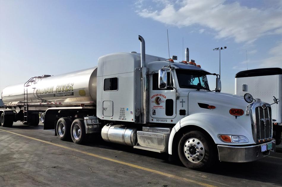 american truck on the road on a sunny day