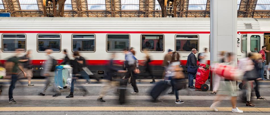 train station platform in milan in blurred background