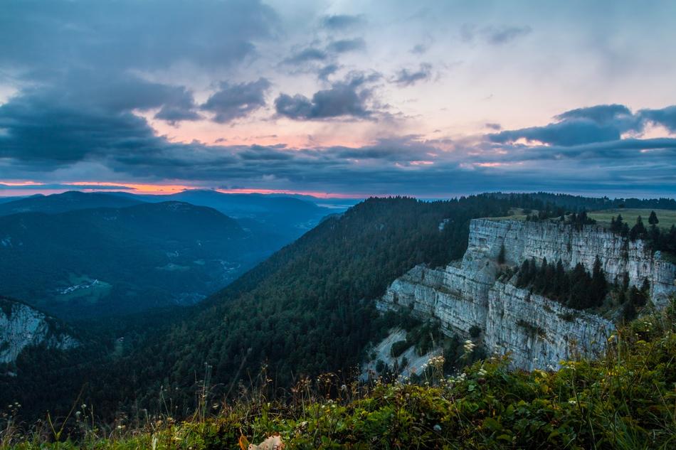 mountain cliff against the background of the evening sky, creux du van