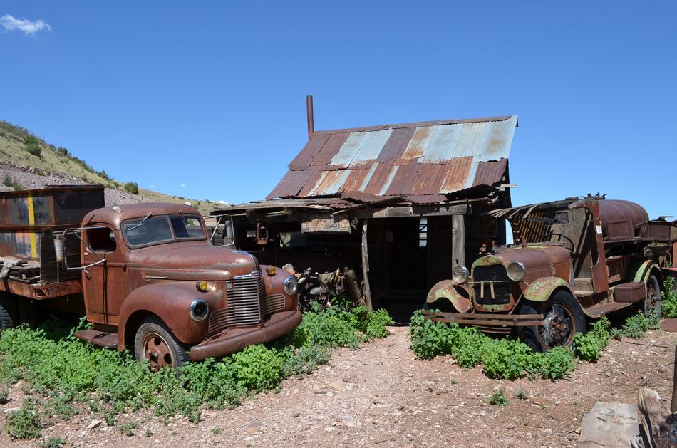 rusty abandoned trucks in arizona nature