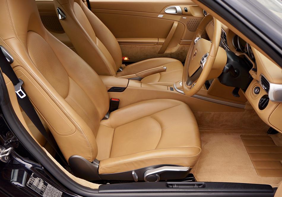 Beautiful, leather interior of the vintage car, in light