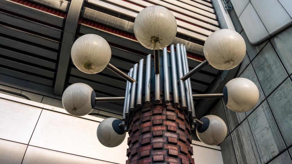 Shiny lamps on the street, near the shiny building