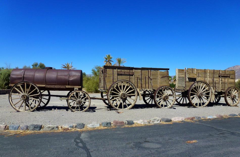 Beautiful landscape with the old trolley, at blue sky on background, in the desert, in USA