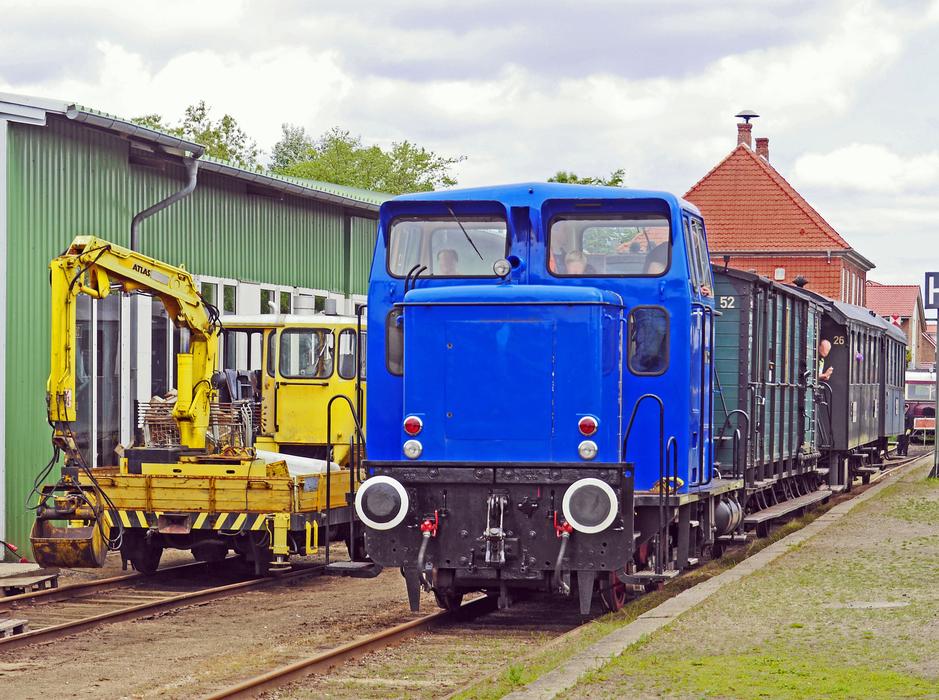 loading crane and diesel locomotive on the railway
