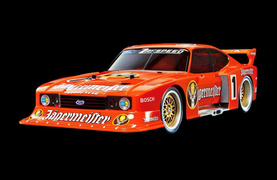 Colorful and beautiful, model car of the Ford Capri, at black background, clipart