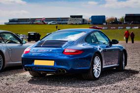 luxury modern car parked in the field