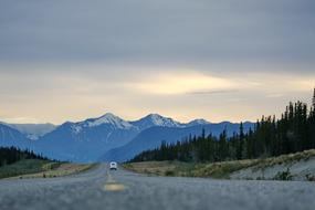 view from the highway to the mountains at dusk