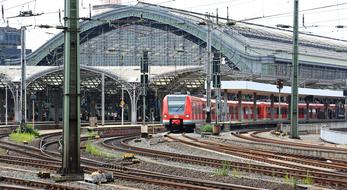 Landscape of the central station, with the shiny train, in Cologne, Germany