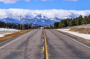 landscape of yellow lines on Road on Mountain in Colorado