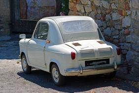 Vintage Vespa 400 Automobile on street