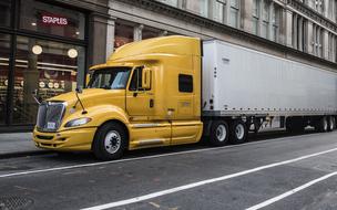 Yellow Truck Cast on road