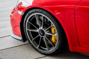 Side view of the beautiful red Porsche 911 Gt3 car