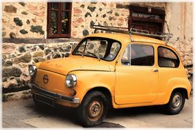 yellow small car wall