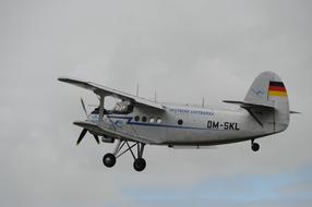 light plane with a propeller in the sky