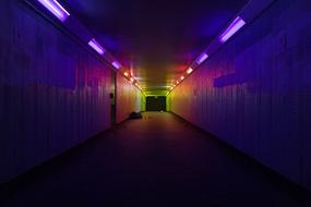 purple lanterns in dark tunnels