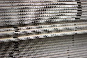Close-up of the stacks of corrugated board, in light