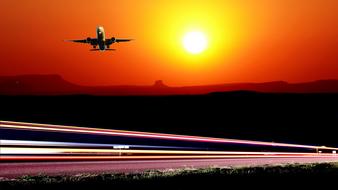 plane land at Sunset