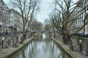 water canal in amsterdam on a cloudy day