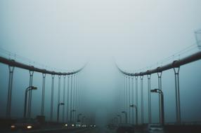 Car Vehicle Transportation on foggy bridge