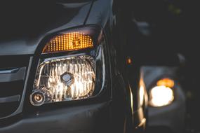 Close-Up photo of Headlights Cars