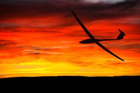 Glider Silhouette at Sunset